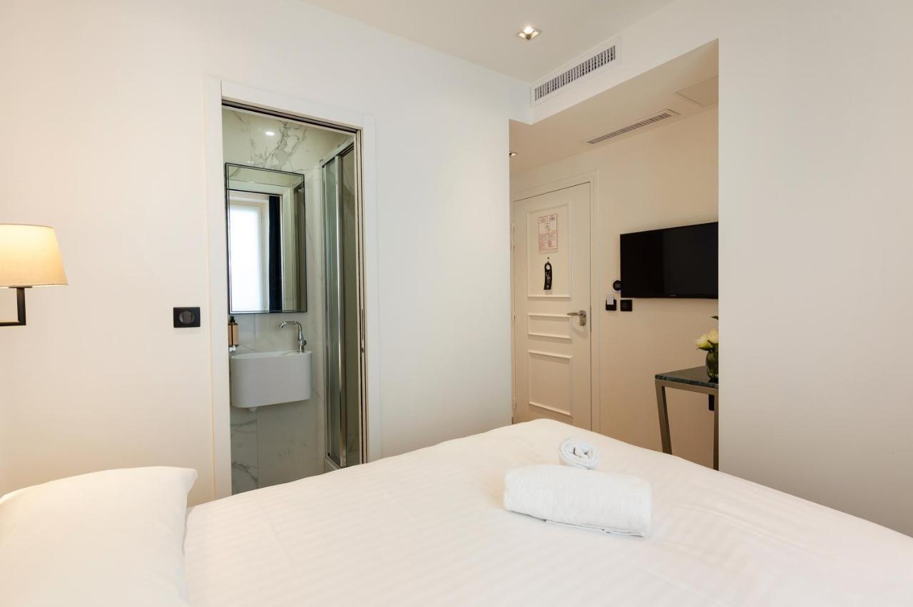 Hotel Au Coeur De Republique Parigi